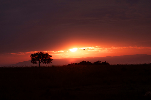 A beautiful African Savannah sunset with clouds in the sky