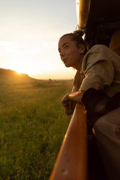 istock Enjoying sunset on a safari tour 1976133264