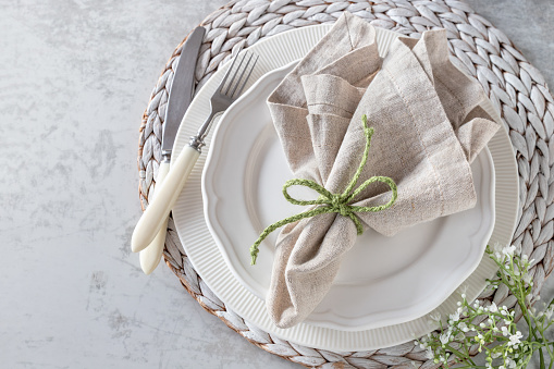 Table setting on white cloth