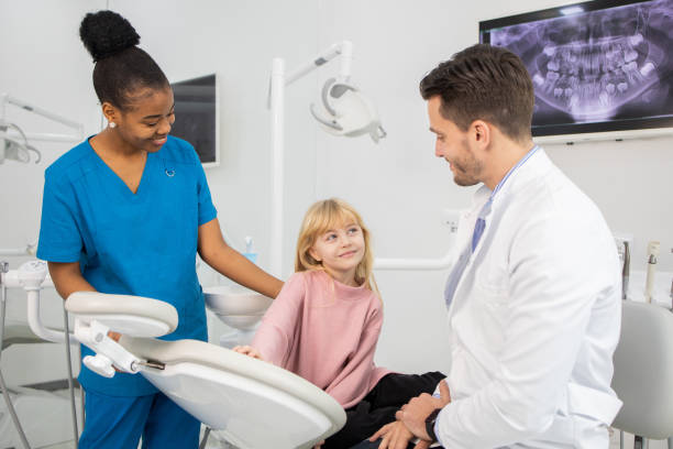 istock Little girl visiting a dentist 1976185738