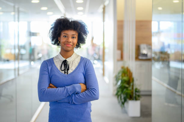 istock Latin woman in office portrait 1976200030