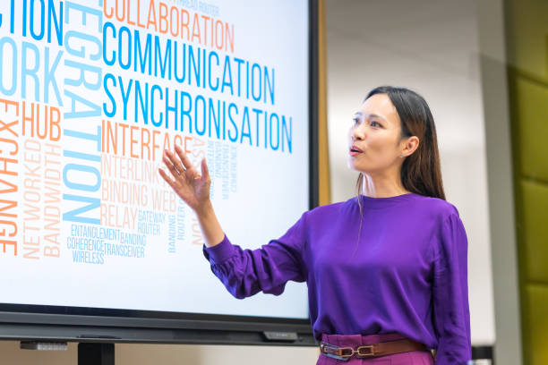 istock Young asian woman giving presentation 1976200035