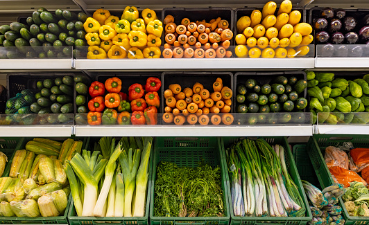 Retail display of organic vegetables at a supermarket - grocery shopping concepts