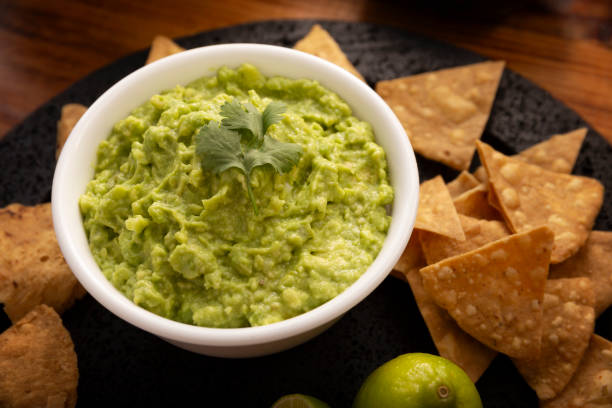 istock Dipping sauce Guacamole closeup 1976221589