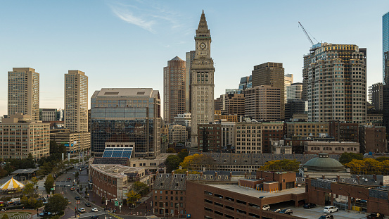 Financial district of Boston, Massachusetts. Skyscrapers skyline with famous Custom House Clock Tower.