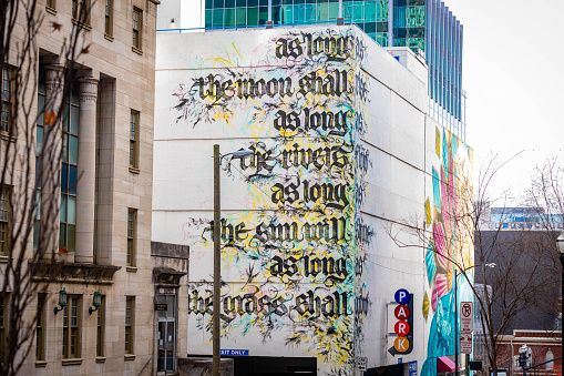 Nashville, TN, USA - 12-24-2023: Nashville downtown walls project graffiti modern art building