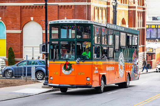 Nashville, TN, USA - 12-24-2023: Famous Old Town Trolley bus tours touristic attraction in Nashville