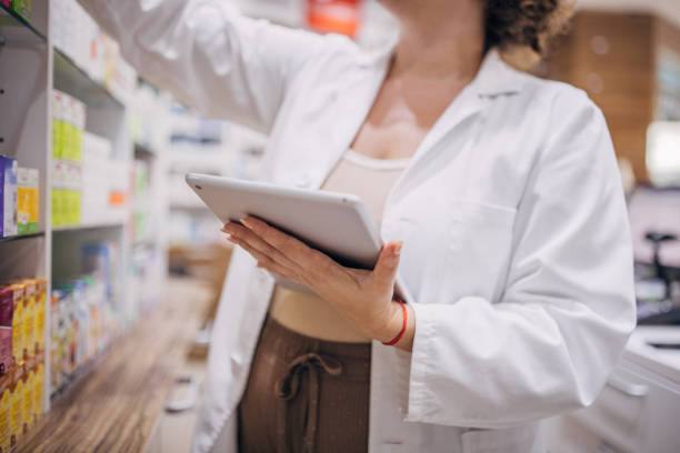 istock Woman working at the pharmacy 1976292713