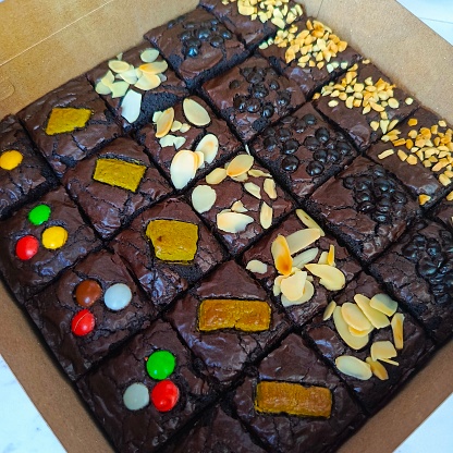 Fudgy brownies with various toppings with detailed photos