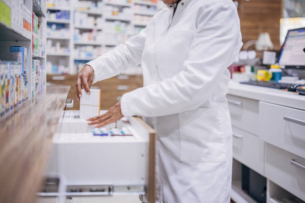istock Woman working at the pharmacy 1976328448