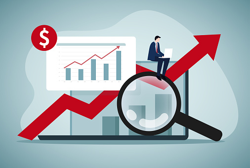 Market research data analysis, analyze business data or financial report, Profit and earning concept, Magnifying glass analyze data on computer laptop.