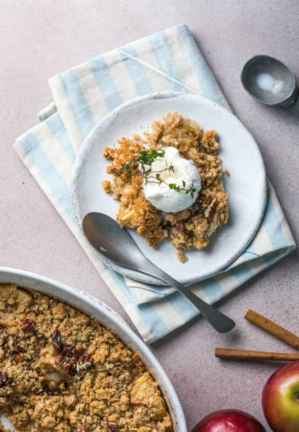 istock close up of apple crumble and ice cream 1976372306