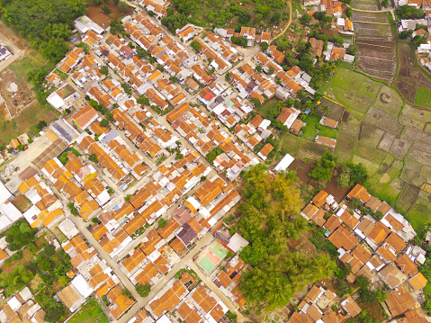 Picturesque Densely Populationd Area. Aerial Photography. Aerial panorama over dense houses from a height of 200 meters. Shot from a flying drone. Cikancung, Indonesia
