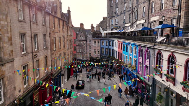 Aerial view of the famous colorful Victoria Street in the Old Town of Edinburgh, Scotland, England, Victoria Street in the United Kingdom, Victoria Street in the old town in Edinburgh Scotland England Crowds of tourists on the Royal Mile,harry potter city