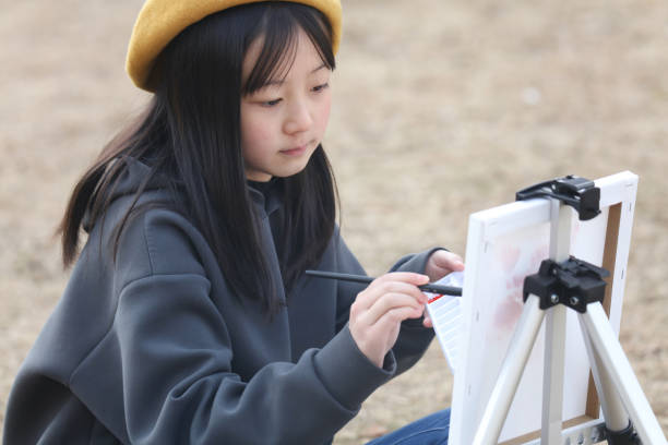 girl drawing a picture