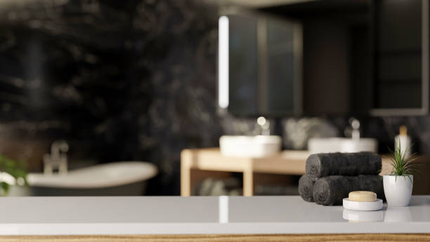 istock A space for displaying your product on a white table in a modern black bathroom. 1976553287