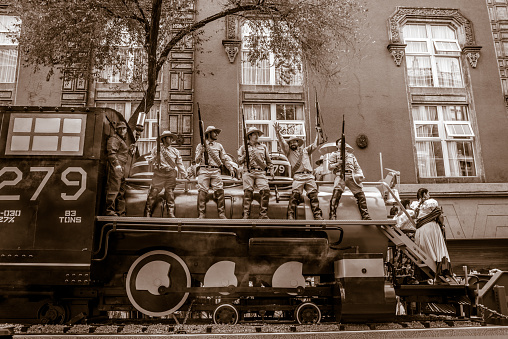 Mexico City Mexico, November 20 /2019 Mexican Revolution commemorative parade historic center Mexico City group of people wearing revolutionary outfits in a representation of a locomotive