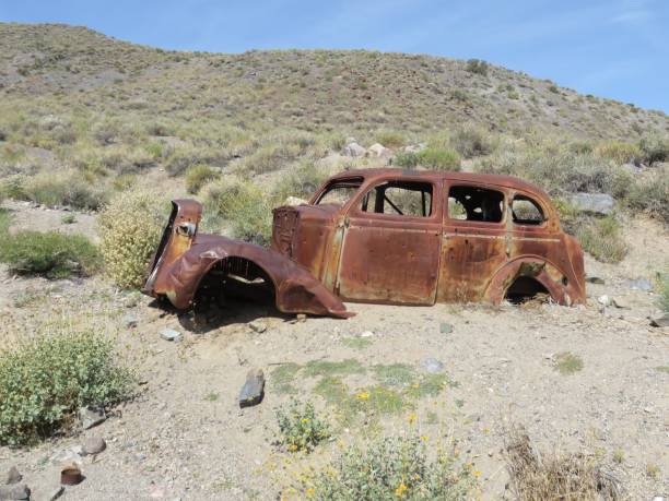 istock Extremely Rusty Classic Car Abandoned in Death Valley National Park 1976629054