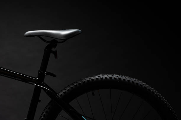 istock Black mountain bicycle on black background close up 1976731464