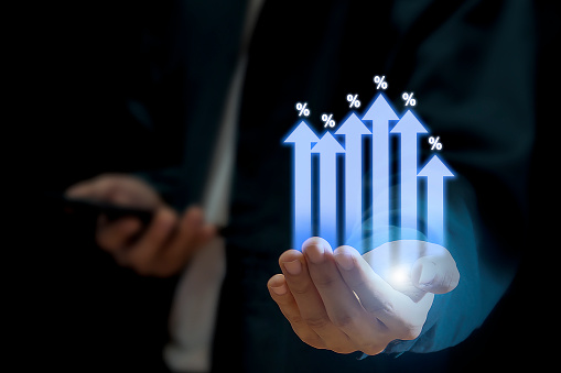 Economic and financial analysis Interest rates, stocks, bonds, loan rates, percentage, up or down, arrow symbol.