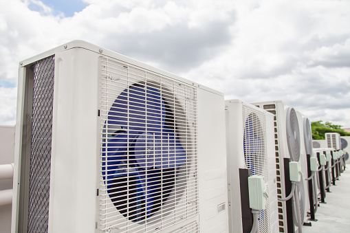 Air conditioning (HVAC) installed on the roof of industrial buildings.