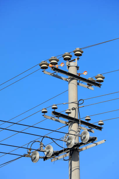 istock Power transmission equipment in blue sky background 1976754515