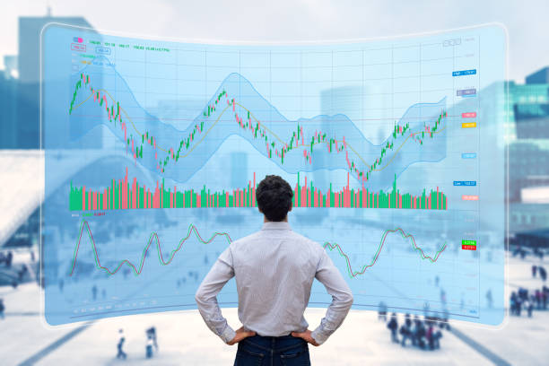 istock Stock exchange trading data and financial investment. Person using online trading interface with charts and statistics on VR computer screen to analyze ETF and ticker price evolution. Sell or buy. 1976755588