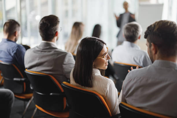 istock Business colleagues talking on a seminar in board room. 1976758772