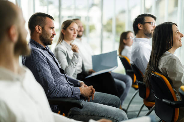 istock Young businessman attending a seminar in board room. 1976765876