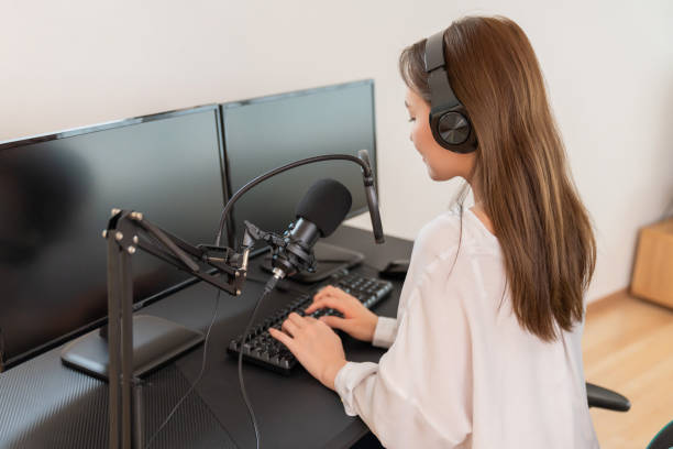 istock young asian woman editing on a computer 1976769020