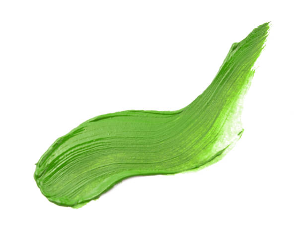 istock Abstract brushstroke of green paint isolated on white 1976779462