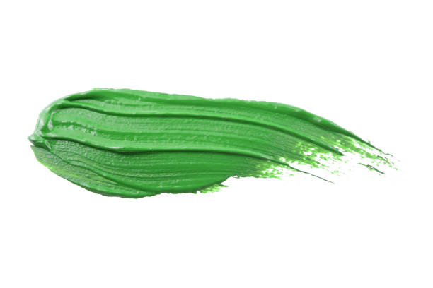 istock paint smear smudge swatch isolated on white background. Cream makeup texture. Colored cosmetic product brush stroke swipe sample 1976783095