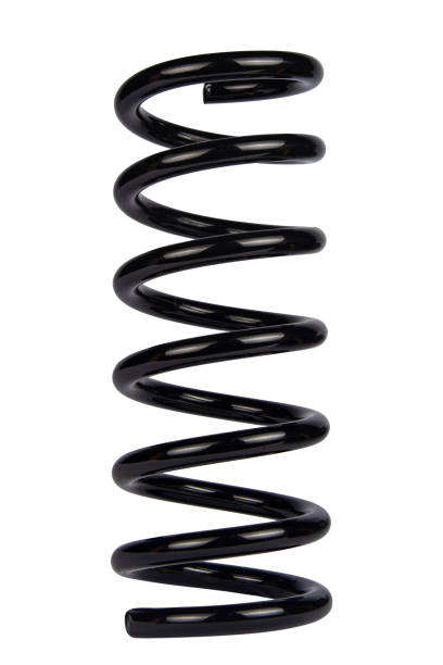 istock Car spare part. Large metal spring on white background. cushioning spring over white background, auto spare parts. automotive suspension springs on a white background 1976788837