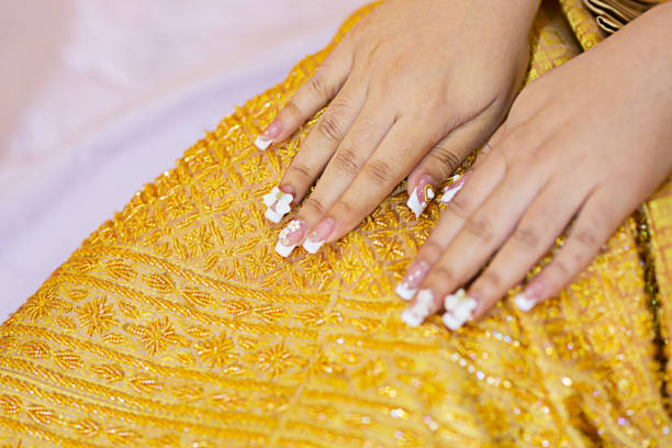 Getting ready for the big day!  Bride's hands with engagement ring on them.