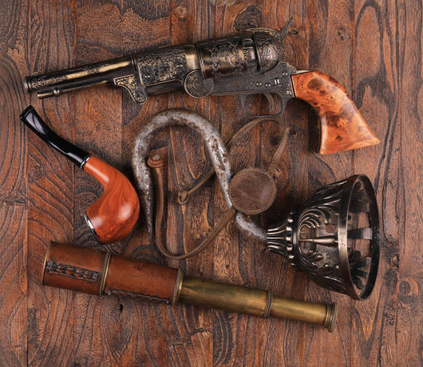 istock pirate items on wooden background 1976794564