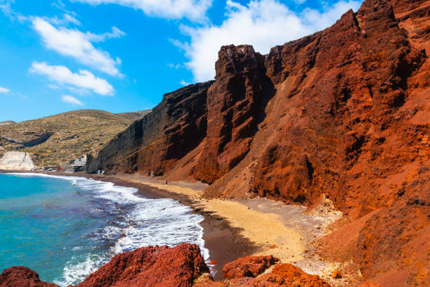 Red beach in Santorini island, Greece. Red volcanic cliffs and the blue sea. Red beach in Santorini island, Greece. Red volcanic cliffs and the blue sea. Summer landscape at sunny day santorin stock pictures, royalty-free photos & images