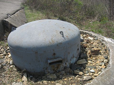 Rundown Water Tower In Park