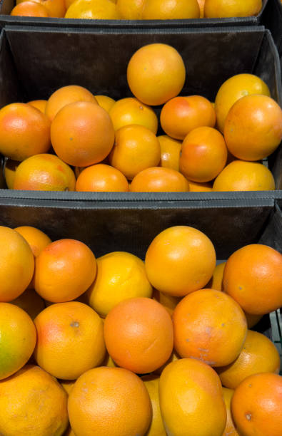istock Oranges on the counter in the market 1976842480