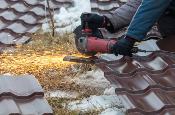 istock A worker cuts metal with a grinder at a construction site 1976846648