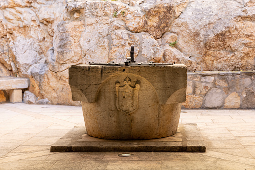 A baptismal font is a special baptismal vessel used in the Orthodox church tradition for the rite of baptism.