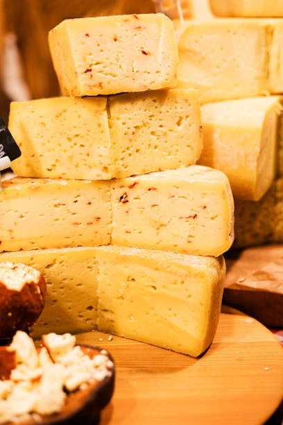 istock different types of cheese on the shop window 1976866181