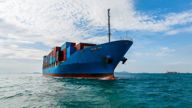 istock logistic cargo container ship sailing in sea to import export goods and distributing products to dealer and consumers across worldwide, aerial front view 1976888598