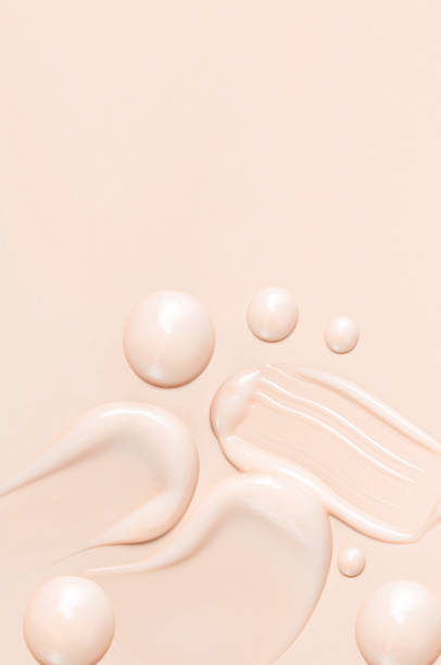 istock cosmetic smears texture on pastel beige background 1976893296