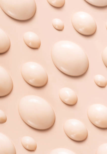 istock cosmetic smears drops of cream texture on beige background 1976893805