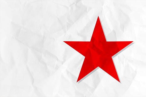 Vibrant bright  red and white crumpled paper horizontal wrinkled vector backgrounds with one painted big pentagram solid star shape symbol with blank copy space