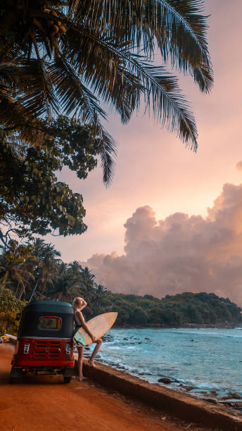 istock Surfing on a tropical island 1976917010
