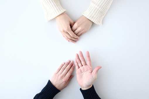 Couple's hands talking with each other