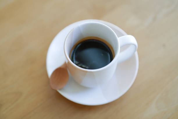 istock A cup of black coffee on the table background. Copy space. 1976934696