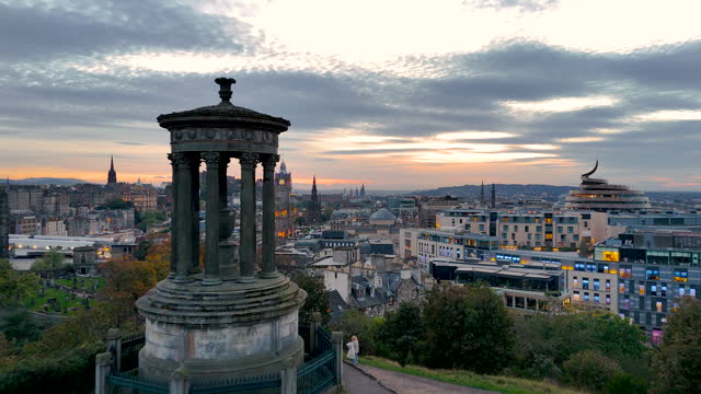 Aerial view of Calton Hill, Edinburgh sunset aerial view, Gothic Revival architecture in Scotland, View of Edinburgh city center from Calton Hill