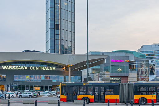 Poland, Warsaw, June 14 , 2023 :   Warsaw Central Railway Station (Polish: Warszawa Centralna) in the city center, tram stop and Palace of Culture and Science in the background